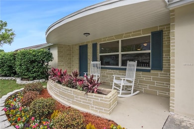 Up close Photo of Cozy Porch and New Landscaping w