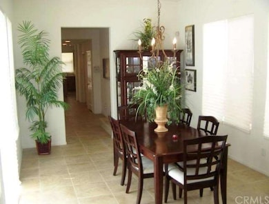 Formal dining facing hall to stairs, kitchen, fami