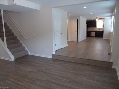 View from Living Room toward Foyer, Dining area and Kitchen.