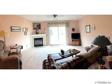Exterior Front. View from Kitchen.  Living Room wi