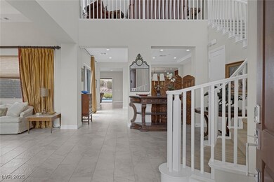 A Welcoming entryway featuring curvature staircase