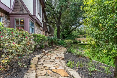 Flagstone path leading you from the driveway to th