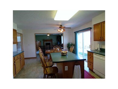 Kitchen. Island adds extra storage and a place for