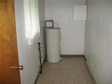Laundry and hot water tank.