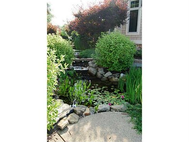Exterior Back. Pond with water fall