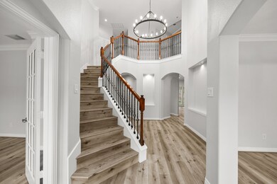 As you walk through the front door you will be greeted by soaring celings and new Luxury Vinyl Plank floors