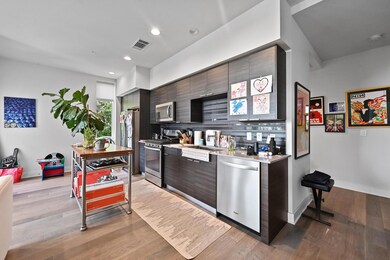 Kitchen featuring appliances with stainless steel