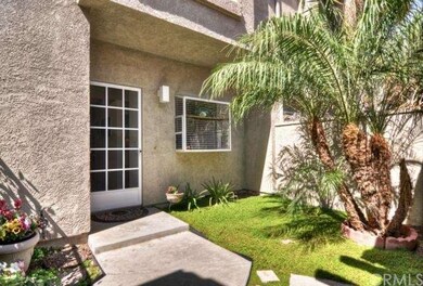 Private enclosed courtyard, the garage door is dir