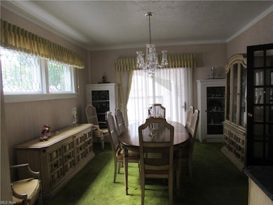 Dining Room off of living room, overlooking backyard.