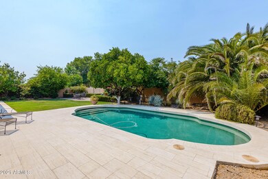 Pool surrounded with travertine