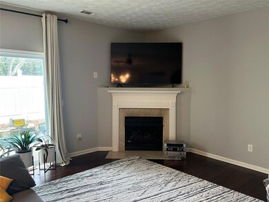 Dining space featuring a chandelier and baseboards