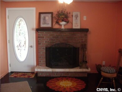 Family Room Den and Side Entrance with working fir