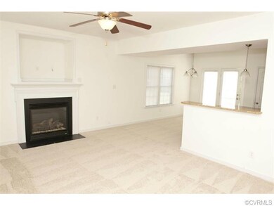 Great room with gas fireplace, TV niche and ceilin