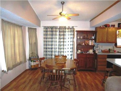 Wonderful dining area with lots of windows and bea
