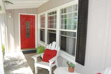 Newly Painted Front Door and Newer Windows with Sh