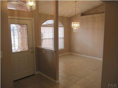 View of the foyer & formal dining room from the family room.