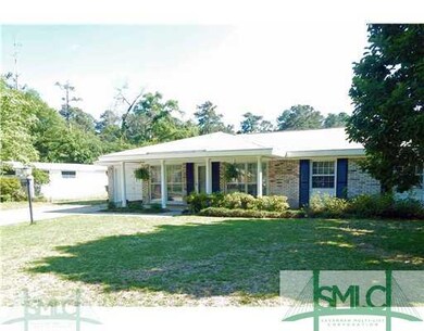 Exterior Front. All brick construction, large cove