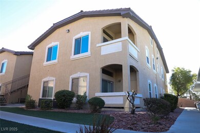 View of home's exterior featuring a tiled roof, st