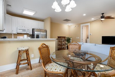 Dining room featuring ceiling fan with notable cha