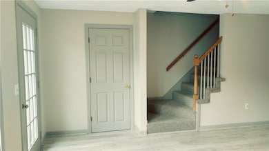 Living Room, coat closet, stairs to bedrooms and f