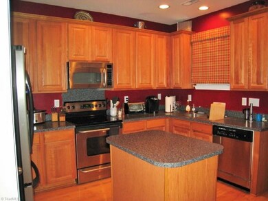 Upgraded Kitchen! Stainless Steel Appliances. Kitchen Island. Cooktop Stove and built-in Microwave.
