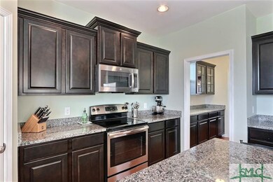 Plenty counter and cabinet space in this kitchen.