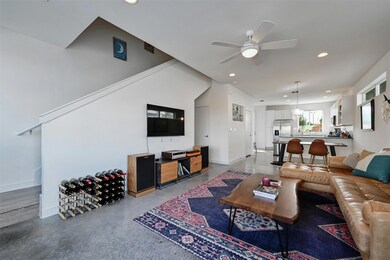 Living room with recessed lighting, baseboards, f