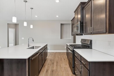 Another veiw of the kitchen. Notice the niche on the wall!