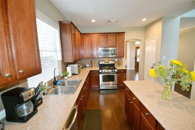 Plenty of counterspace and a center island with extra storage space.