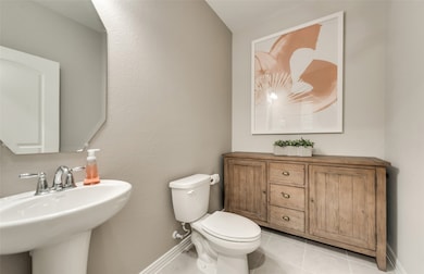 Convenient first-floor powder room *Model representation
