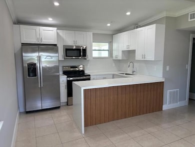 5580 Honeysuckle Dr, West Palm Beach, FL 33415 - photo 2