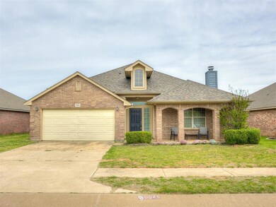 View of front facade featuring a front lawn and a 
