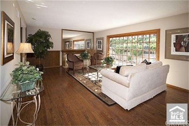 The fireplace at the end of the room will provide 