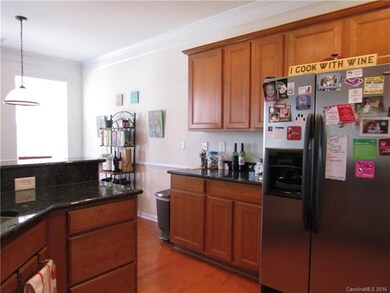 Kitchen has plenty of cabinet space, as well as a 