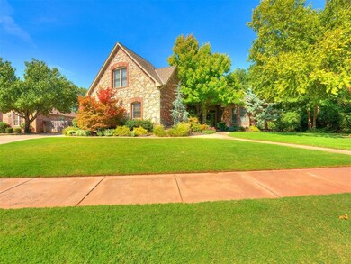 Tudor-style house featuring a front yard