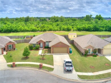Front: Located on a greenbelt lot across from the 