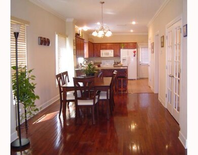 Dining Room. A view of dining and kitchen area from living room