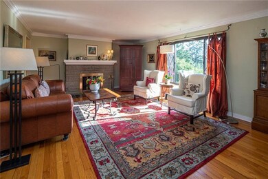 Living room with natural light ... rich hardwood f