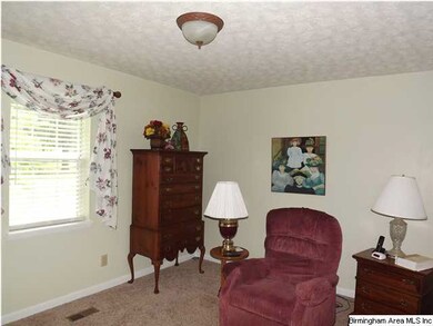 ONE OF 3 BEDROOMS, THIS ONE MAKES A COZY DEN