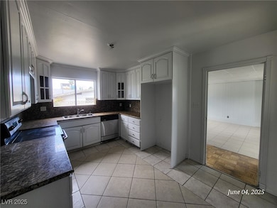 Kitchen featuring appliances with stainless steel