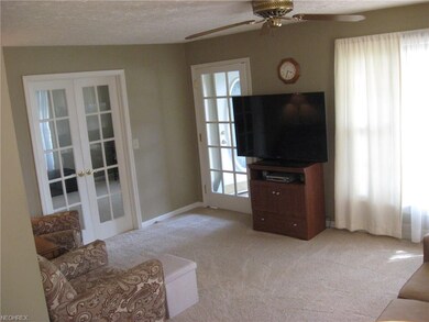 Living room is L-shaped.  This is the 13 x 11 area