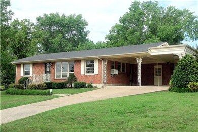 Three cars can be parked under the carport. There is als a good storage room accessable from the carport.