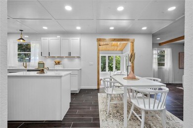 Custom tile flooring, Custom ceilings, added light