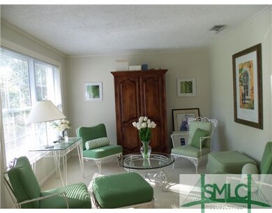 Living Room. FLORIDA FEEL WHITE TILE, NEW WINDOWS.