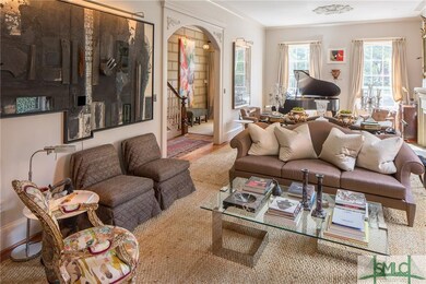 Double Living Room is embellished with period carv