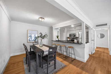 Dining room featuring light wood-style floors, vis