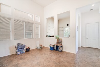 Den/Office/Sitting Room is located in front of hom
