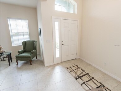 Grand entry with a lot of natural light and high ceilings.