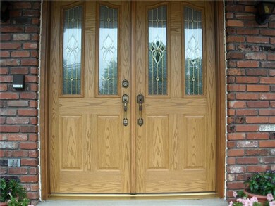 Beautiful newer beveled glass front door entrance.