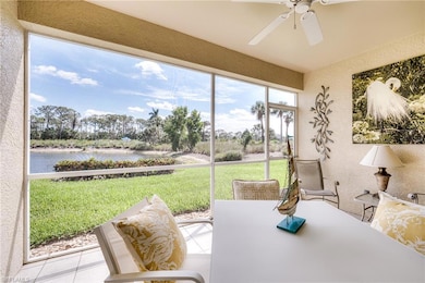 Tiled dining area featuring a water view and a cei